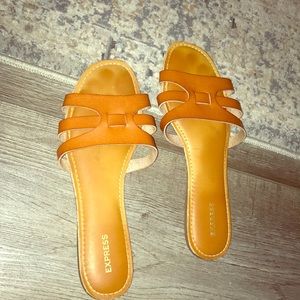 Reddened brown slip on Sandals